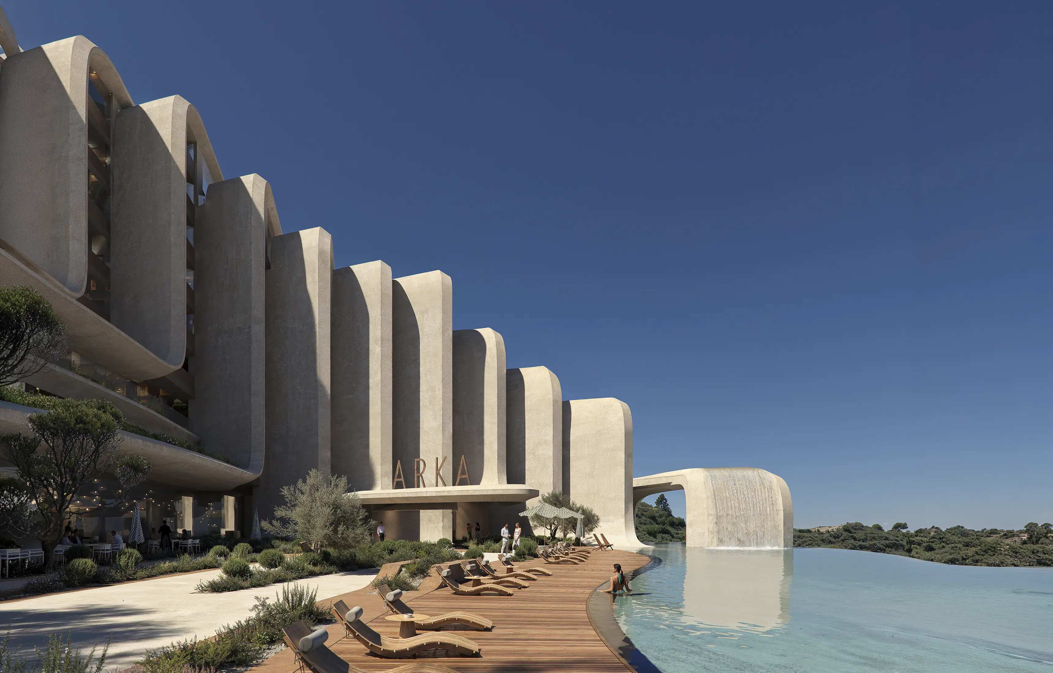 The Cascades hotel extension by Zaha Hadid Architects in Tirana, an infinity pool with a waterfall over the hillside