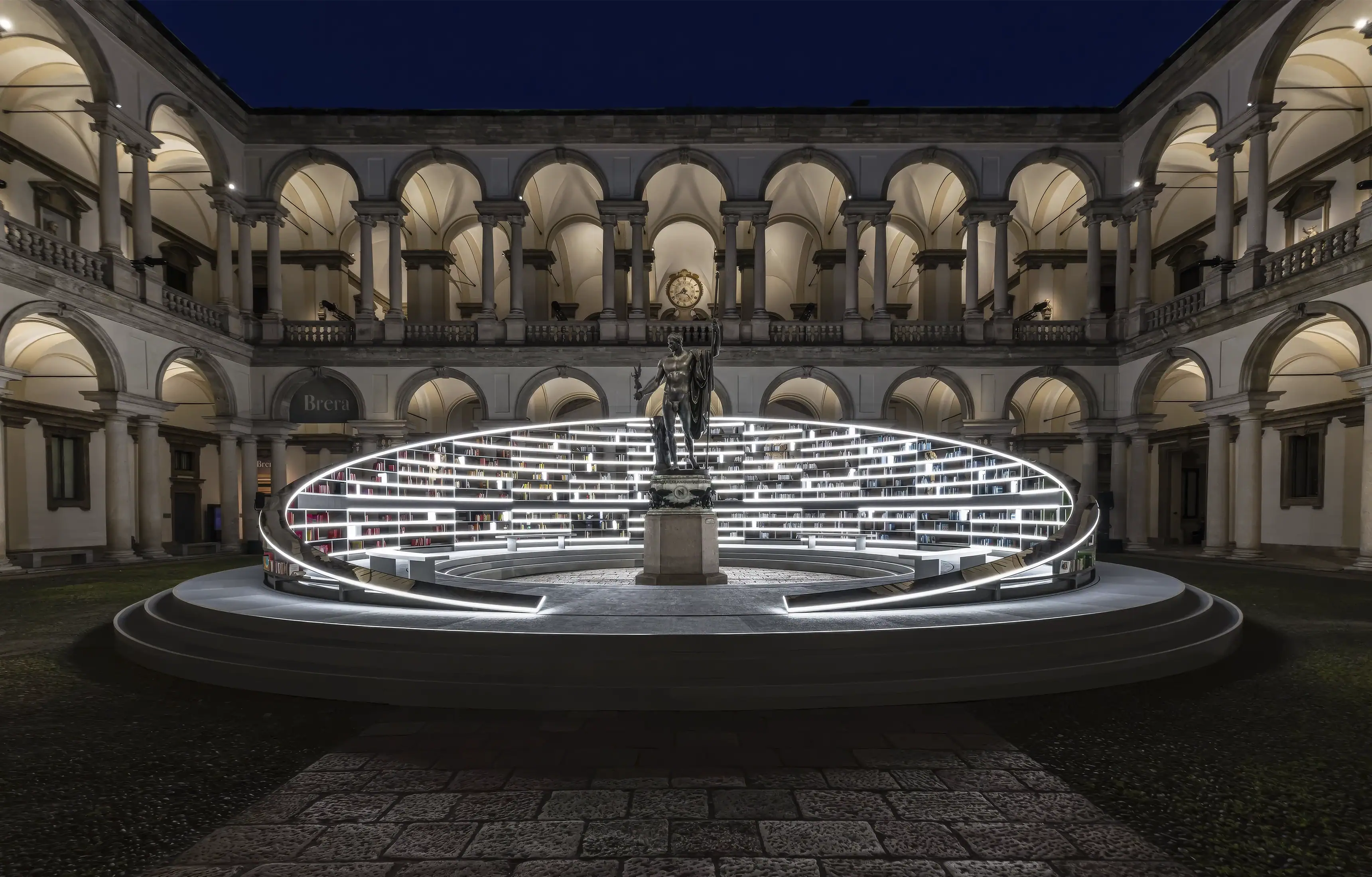 Es Devlin's Library of Light installation in Palazzo Brera's courtyard during Milan Design Week 2025